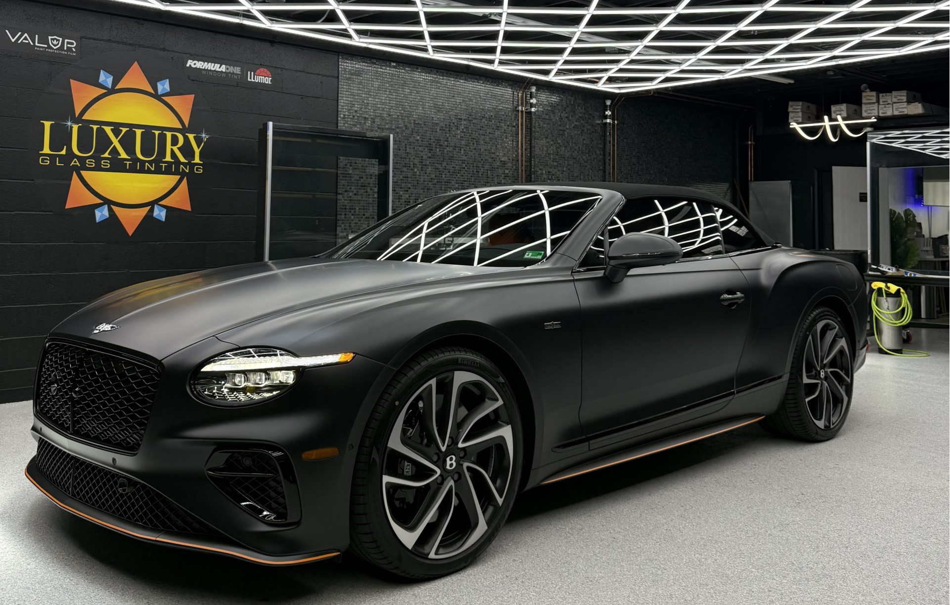 A sleek car with newly tinted windows.