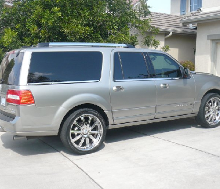 Reflective chrome vinyl wrap professionally installed on a luxury car