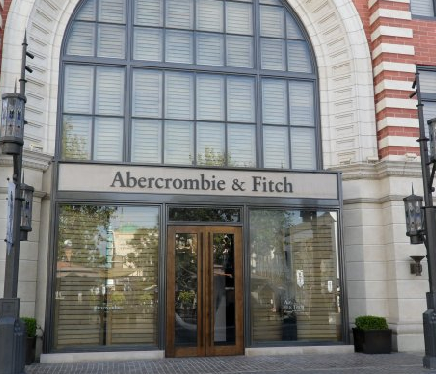 Wide-angle shot of a modern retail location with tinted front glass panels