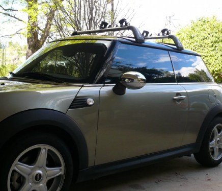 Glossy car finish reflecting light after PPF application