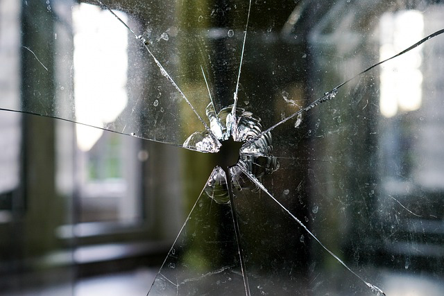 This photo shows a cracked office window