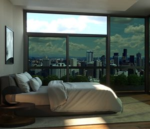 A bedroom interior with decorative window film adding style and privacy